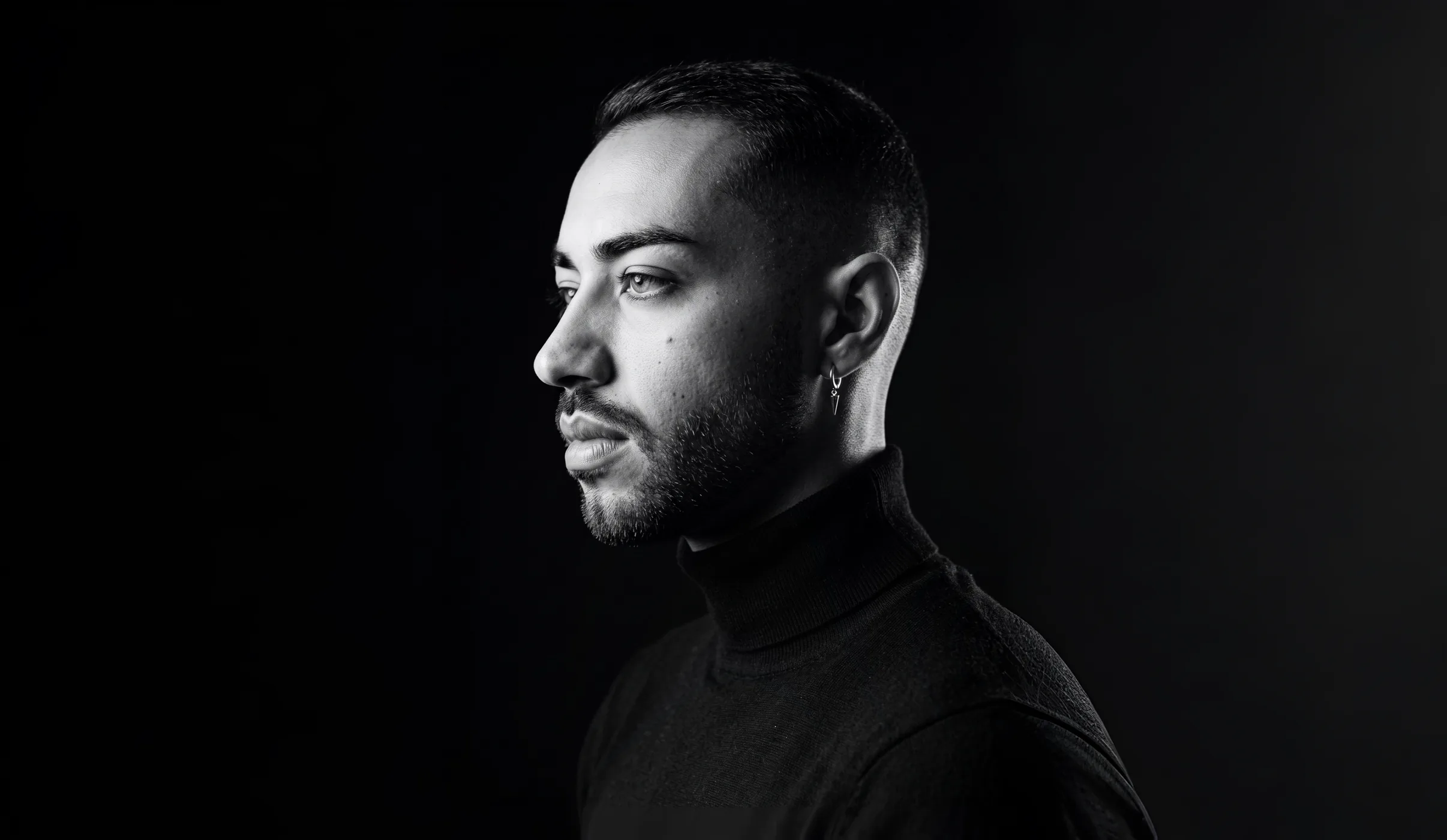 Jiffy Trice in a black and white profile portrait